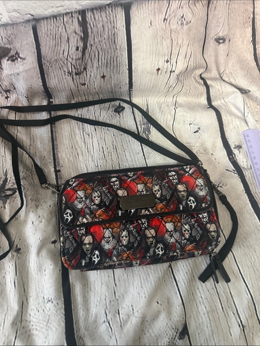 Raina deluxe wallet Crossbody Bag with Black and Red Horror Print used once new